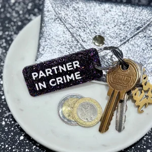 PARTNER IN CRIME Porte-clés à paillettes
